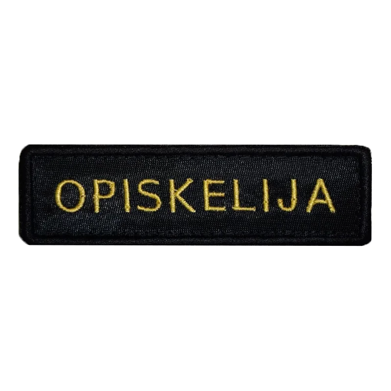 Brodeerattu "Opiskelija" velcrokiinnikkeinen kyltti