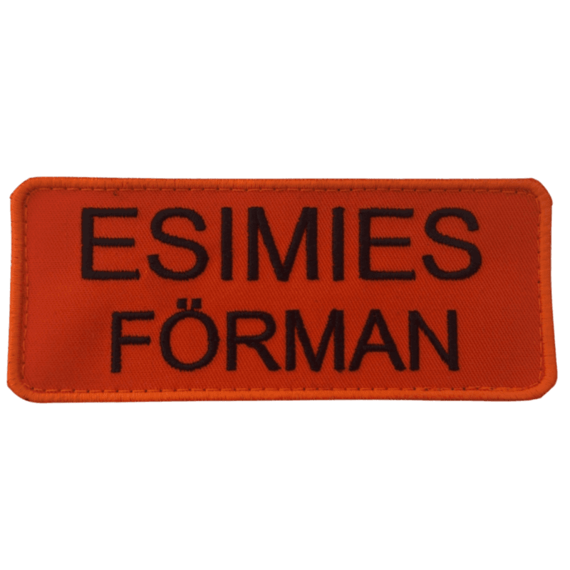 ESIMIES - FÖRMAN Rintakyltti