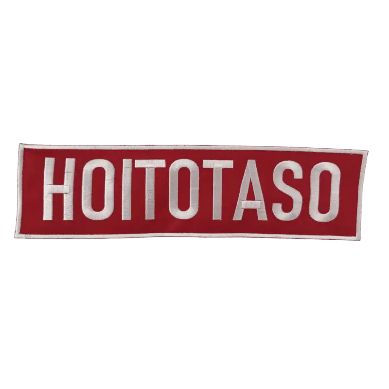 HOITOTASO Selkäkyltti - Brodeerattu